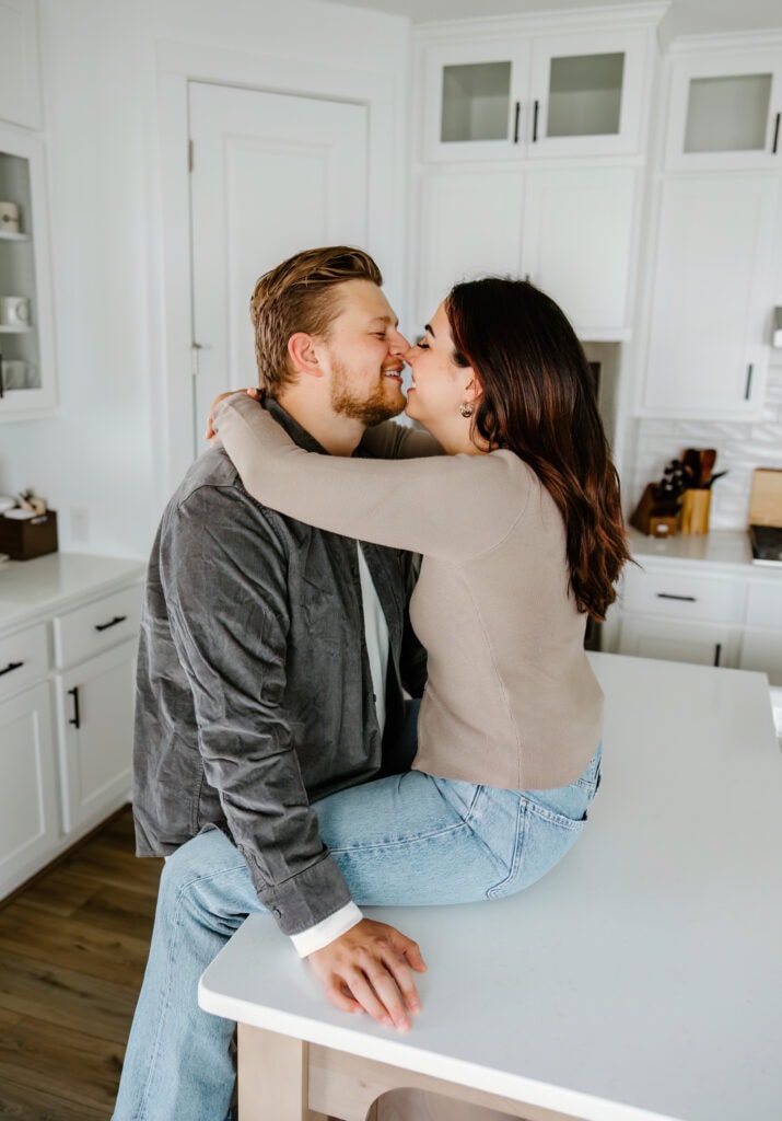 couple on kitchen counter | in home family session
