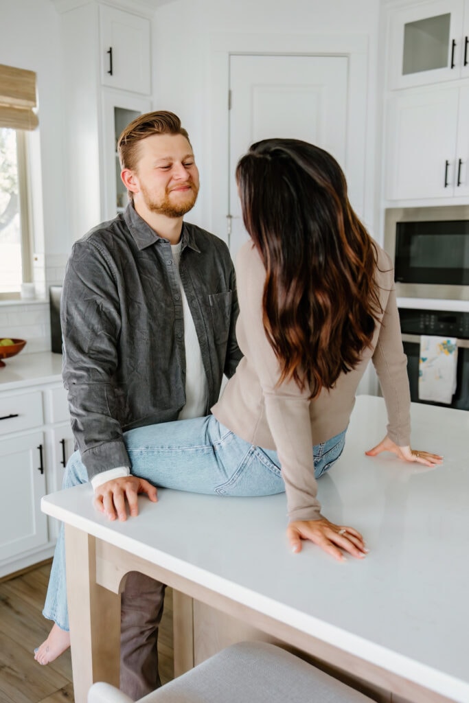 couple on kitchen counter | in home family session