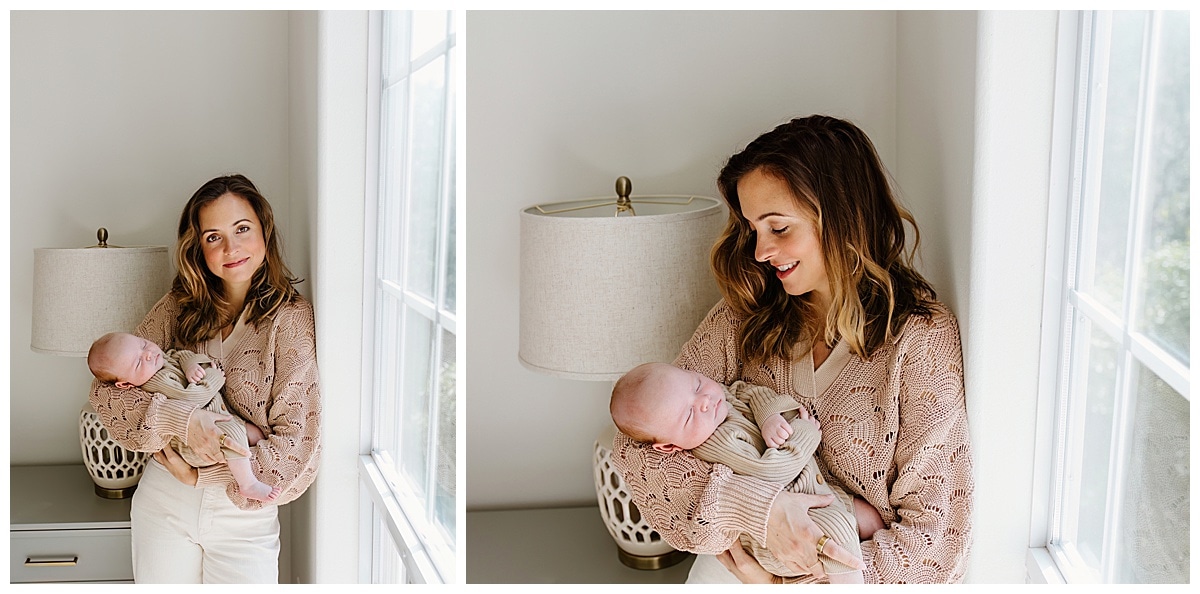 Mom smiles at newborn for Austin Motherhood Photographer