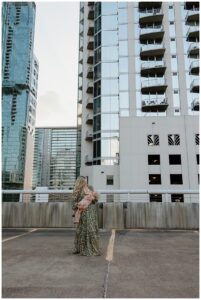 Mama and baby nursing during Downtown Austin Rooftop Family Session