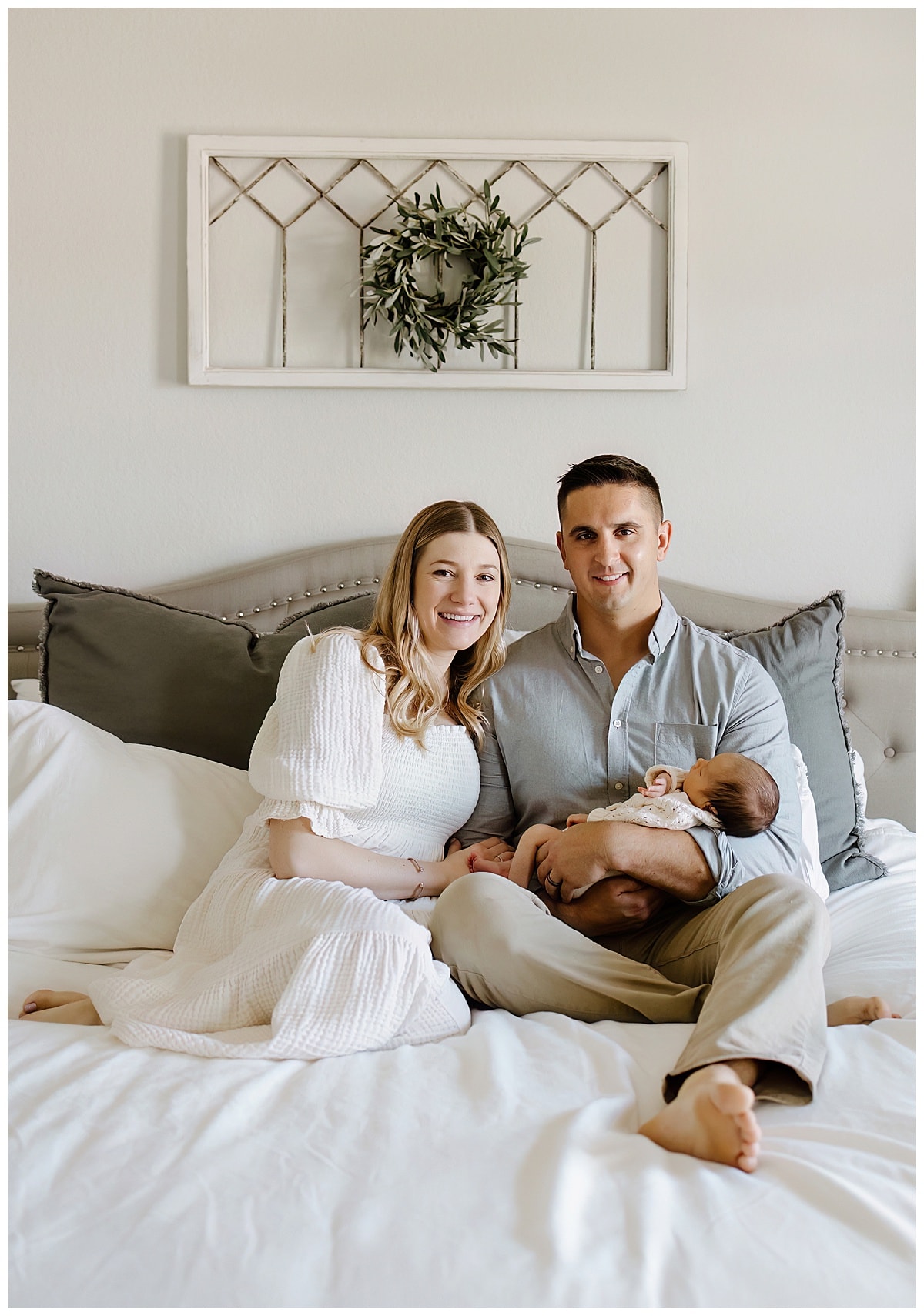 Mom and dad cuddle with baby for Austin Newborn Photographer