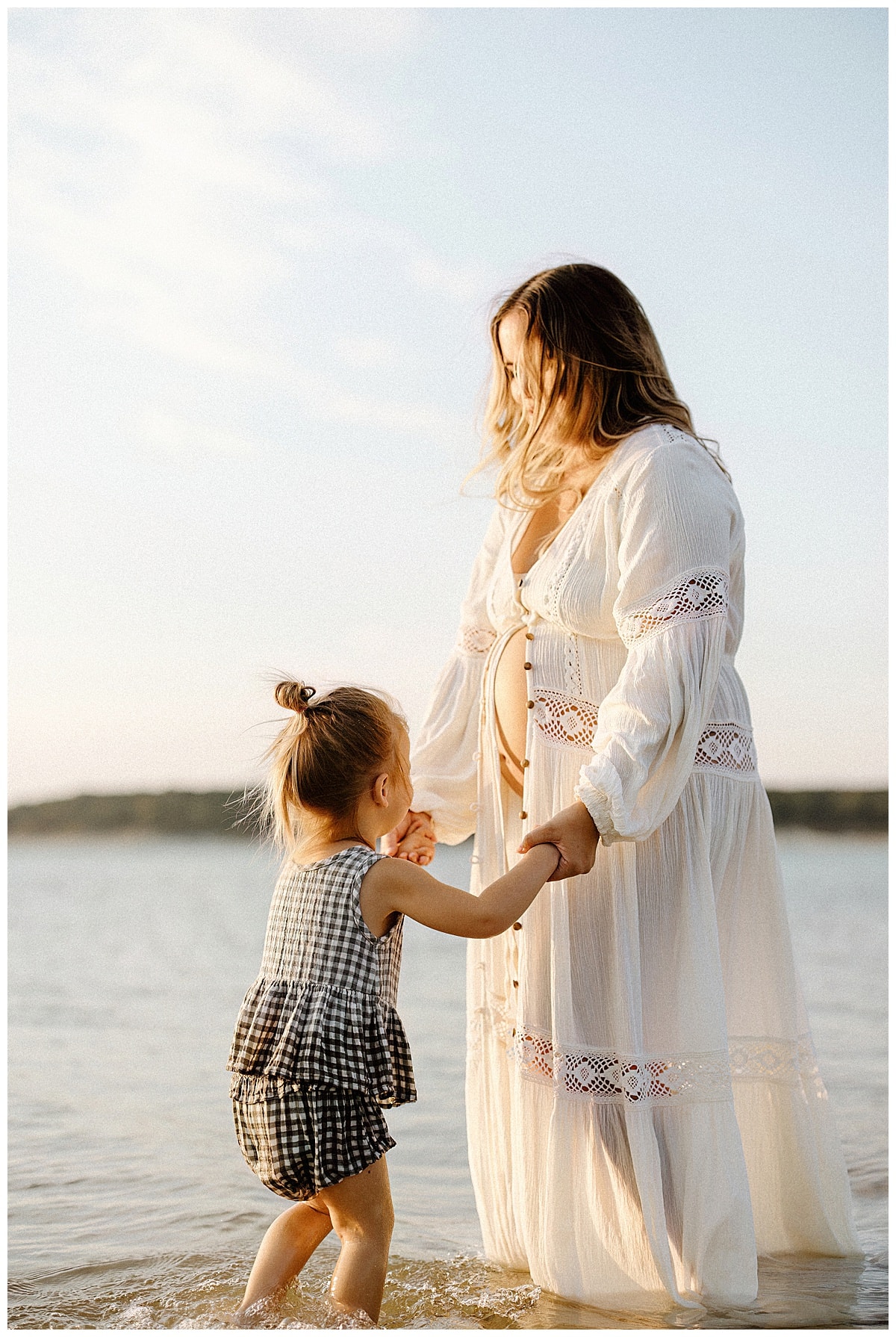 Mom and daughter dance in water together for Austin Motherhood Photographer