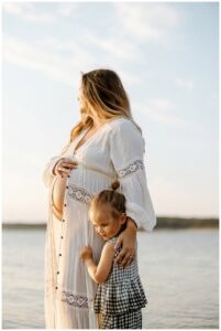 Mother and daughter share a hug for Our Adventuring Souls Photography