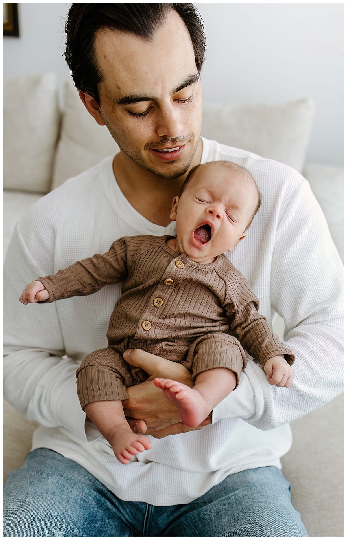 Dad holds baby for Austin Newborn Photographer