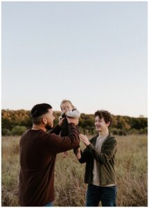 Dad plays with his sons for Austin Lifestyle Photographer