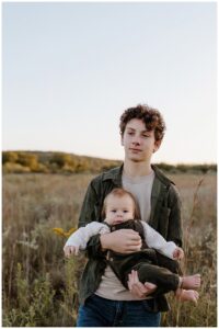 Older brother holding younger brother for their Sunrise Family Photos