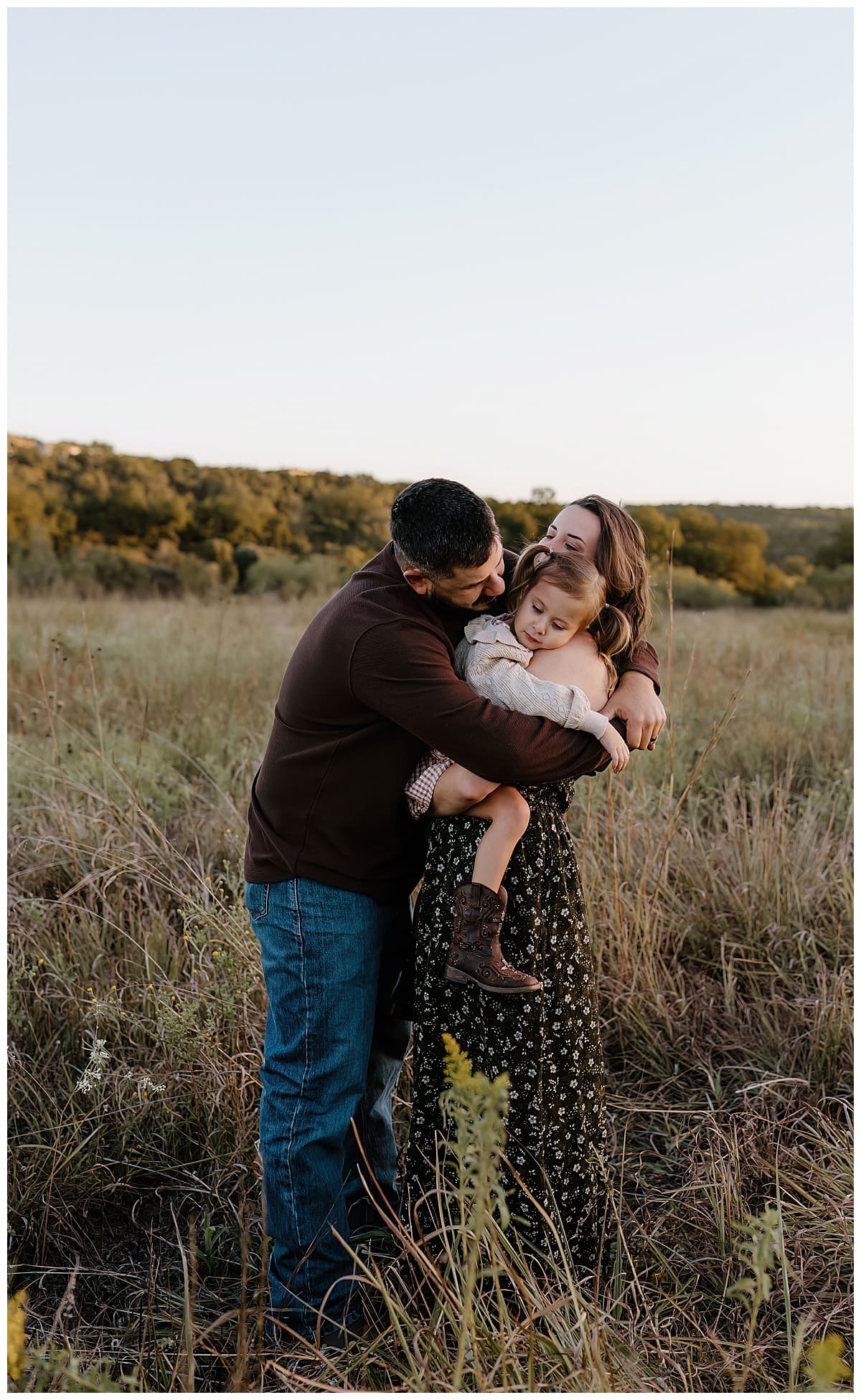 Parent hug young child for Austin Lifestyle Photographer