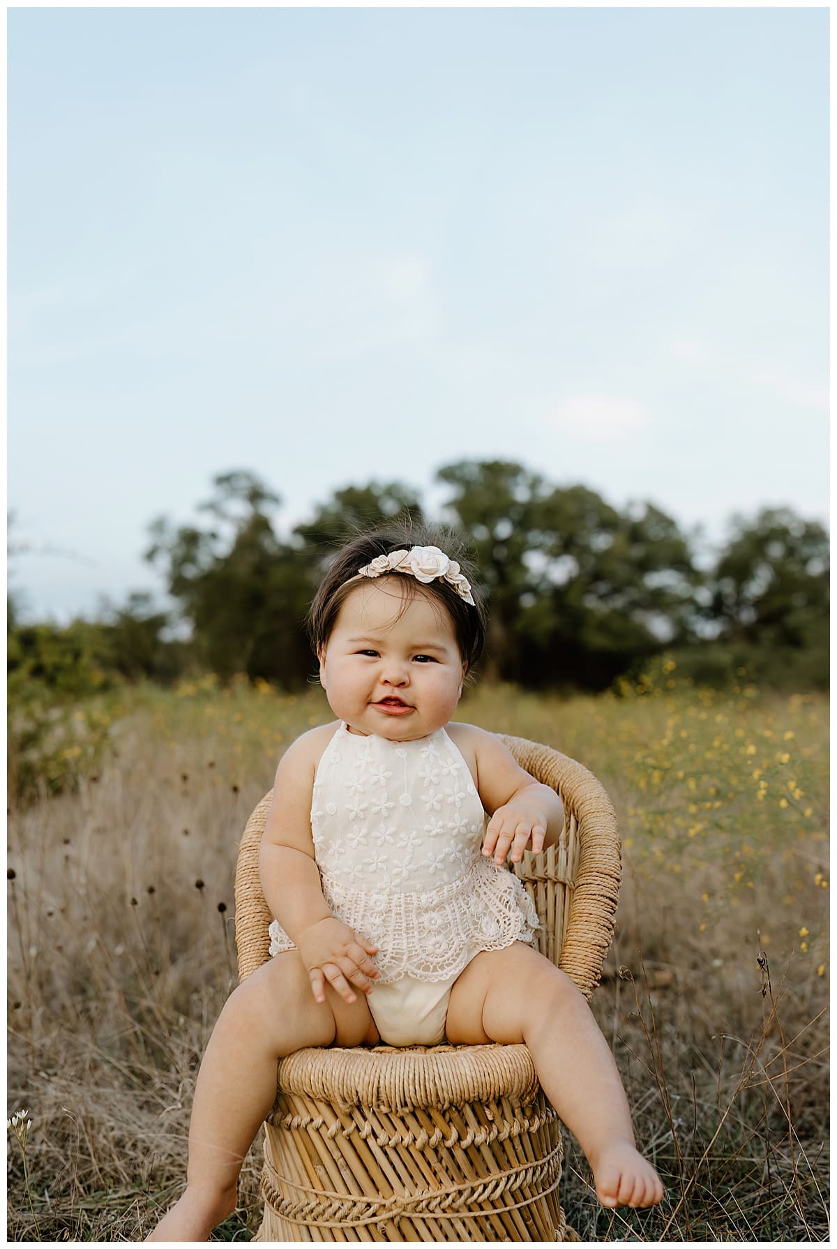 Baby girl sits on a chair for Our Adventuring Souls Photography