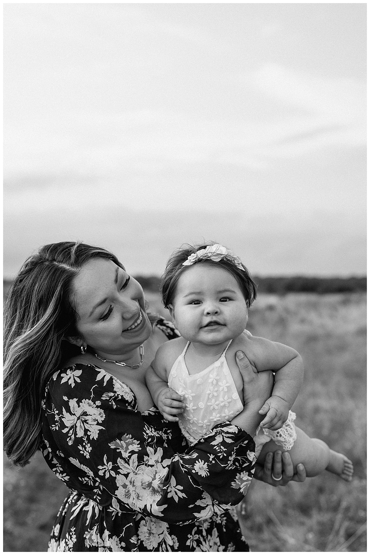 Mom smiles at baby girl for Austin Motherhood Photographer