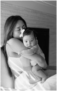 Mom holds baby girl for Austin Motherhood Photographer