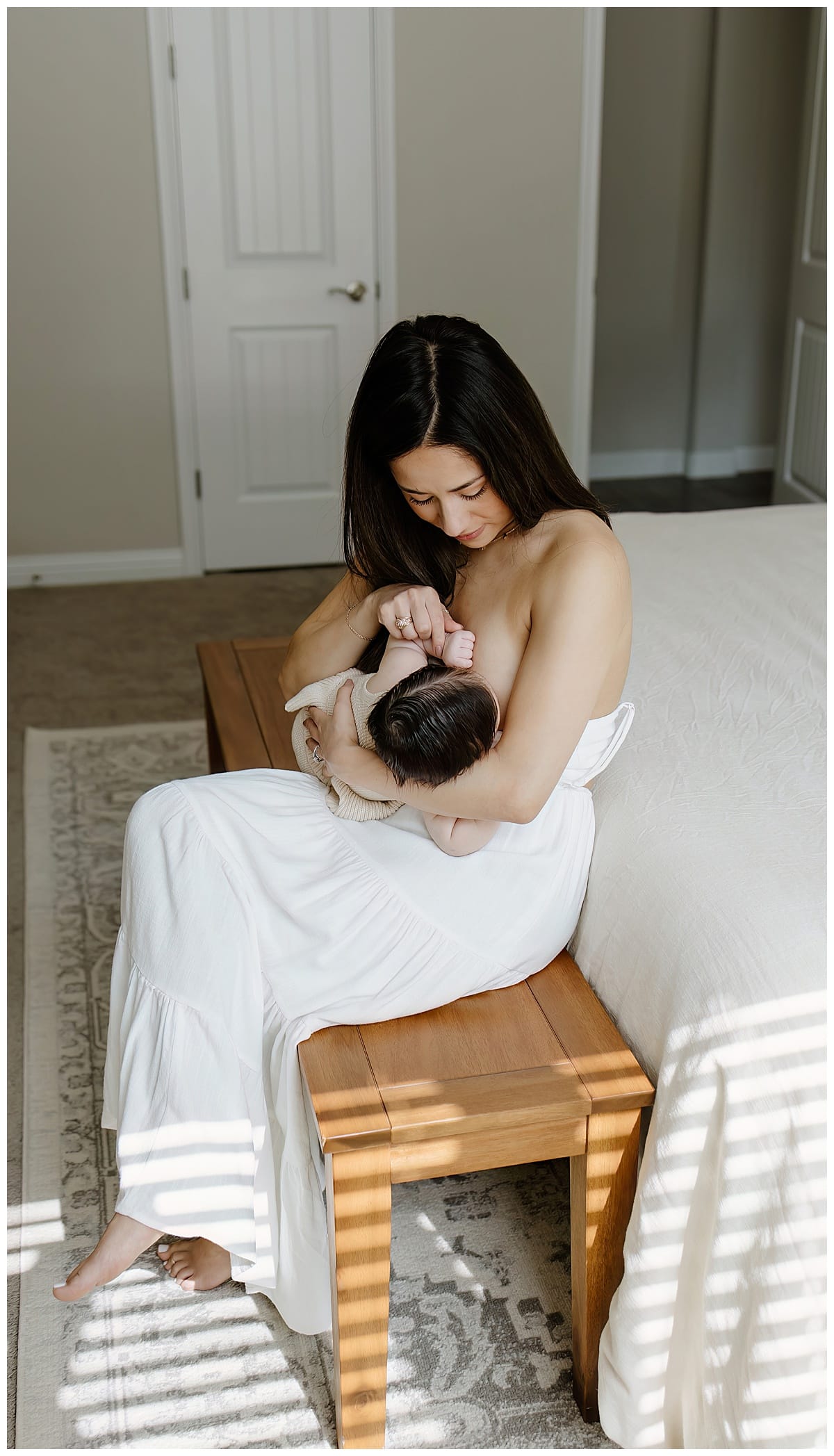 Mom nurses baby girl for Austin Motherhood Photographer