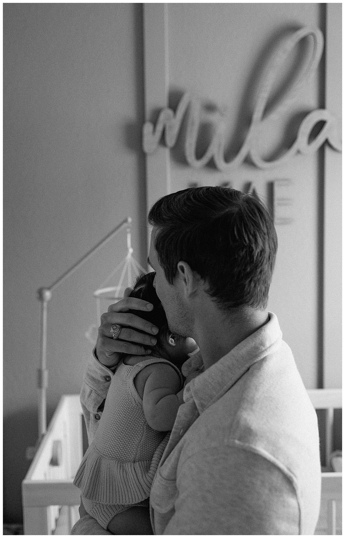 Dad kisses baby girl for Austin Motherhood Photographer
