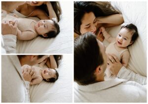 Mom and dad lay on the bed with baby girl for Our Adventuring Souls Photography