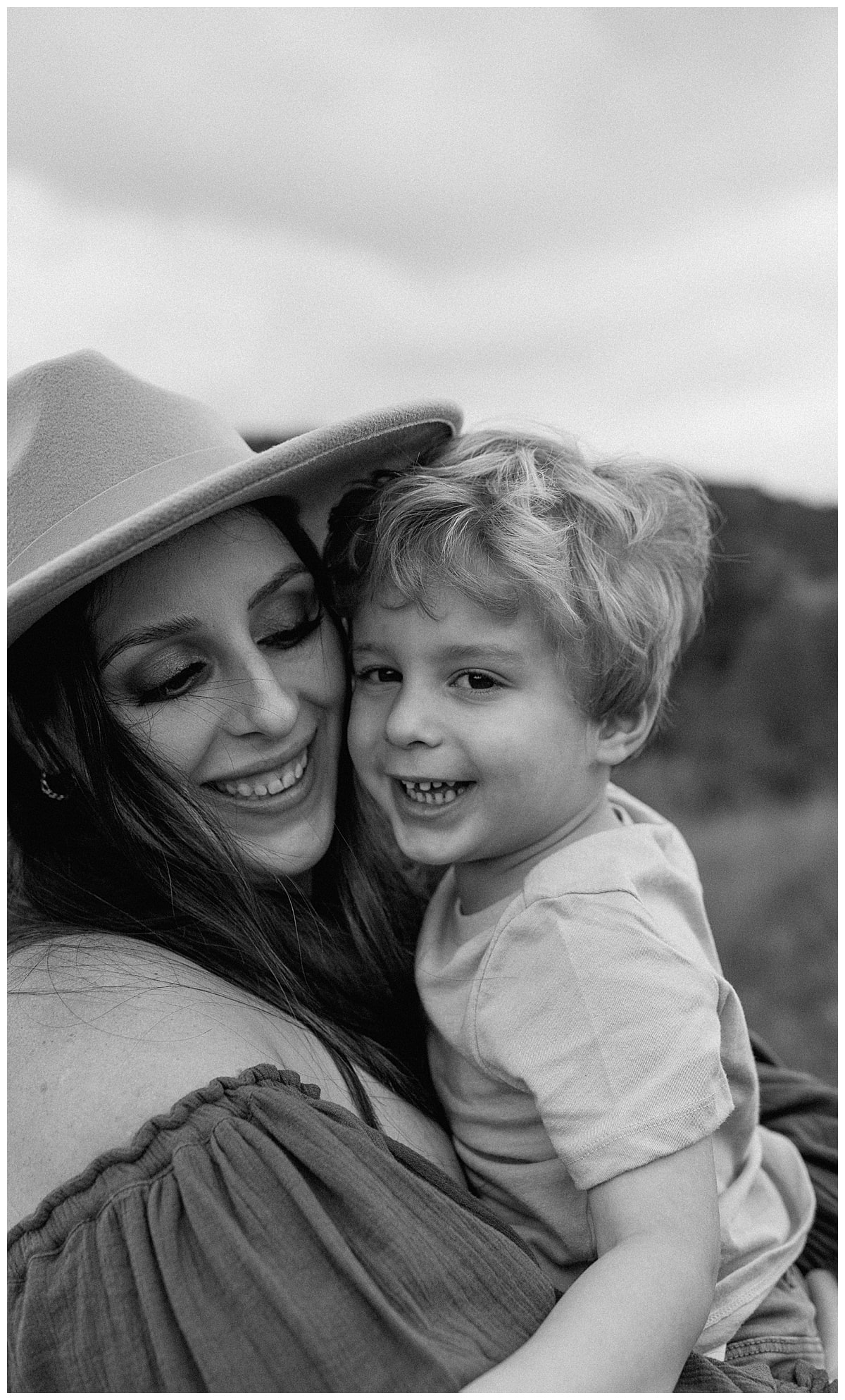 Mom holds son for Our Adventuring Souls Photography