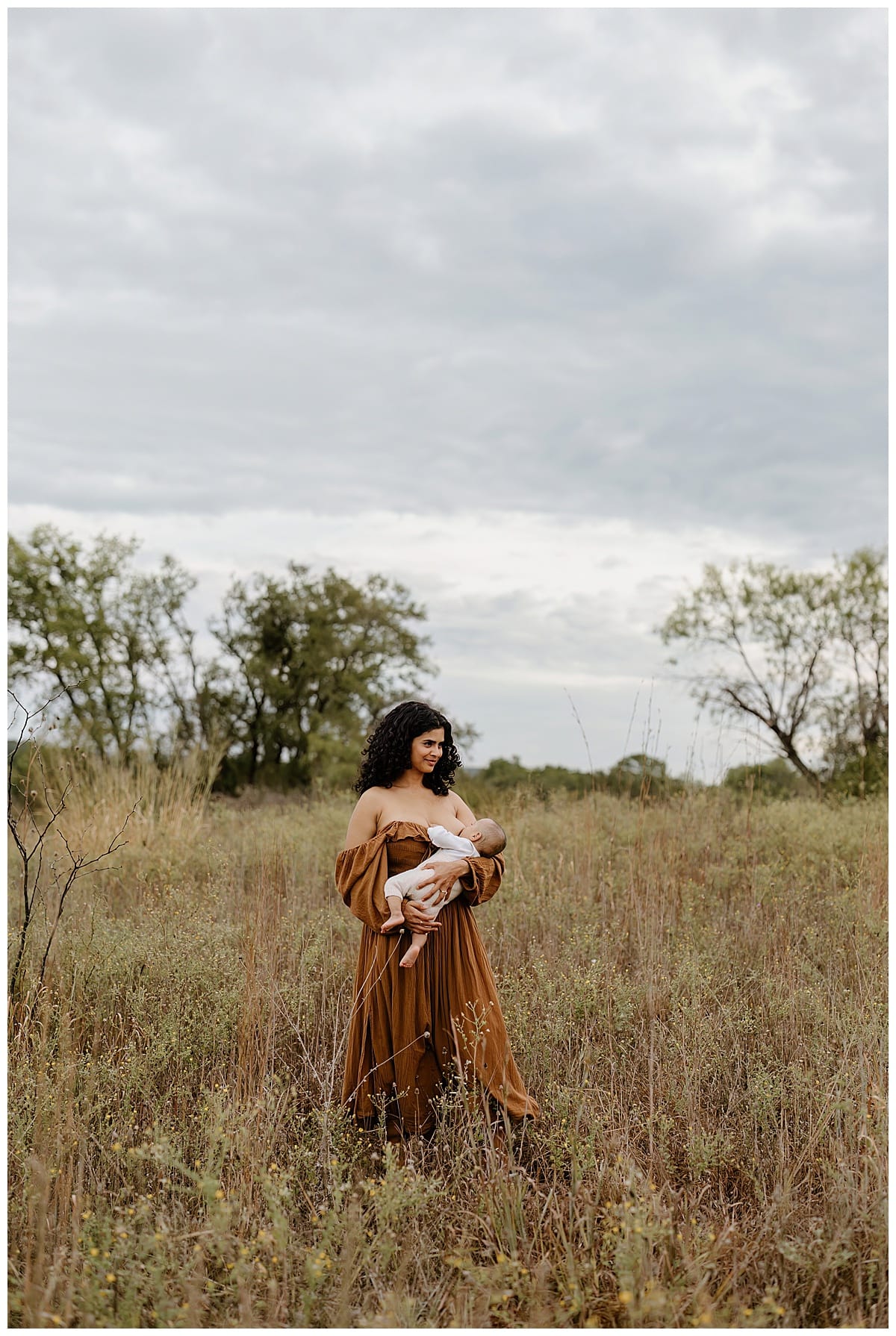 Mom holds son in an open field for Our Adventuring Souls Photography