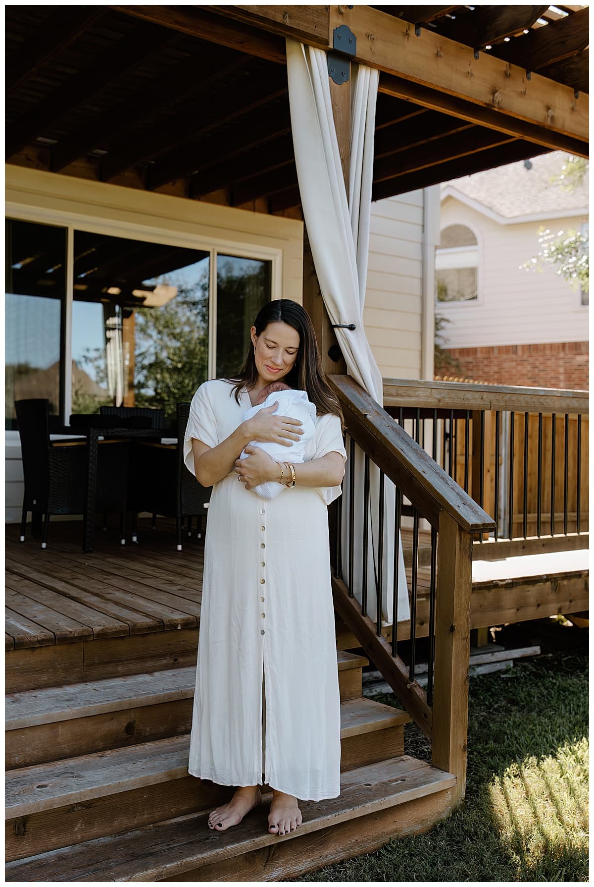 Mom cuddles newborn close for Austin Lifestyle Photographer