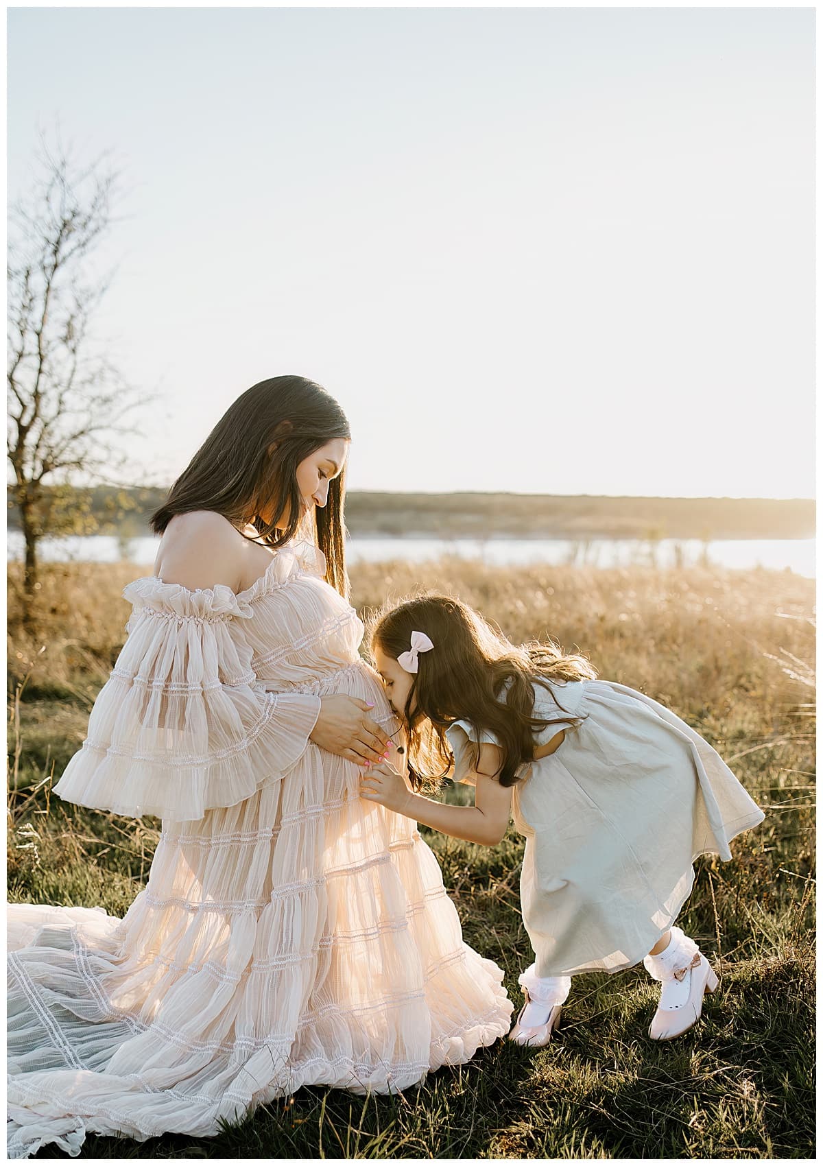 Daughter kisses pregnant belly for Austin Motherhood Photographer