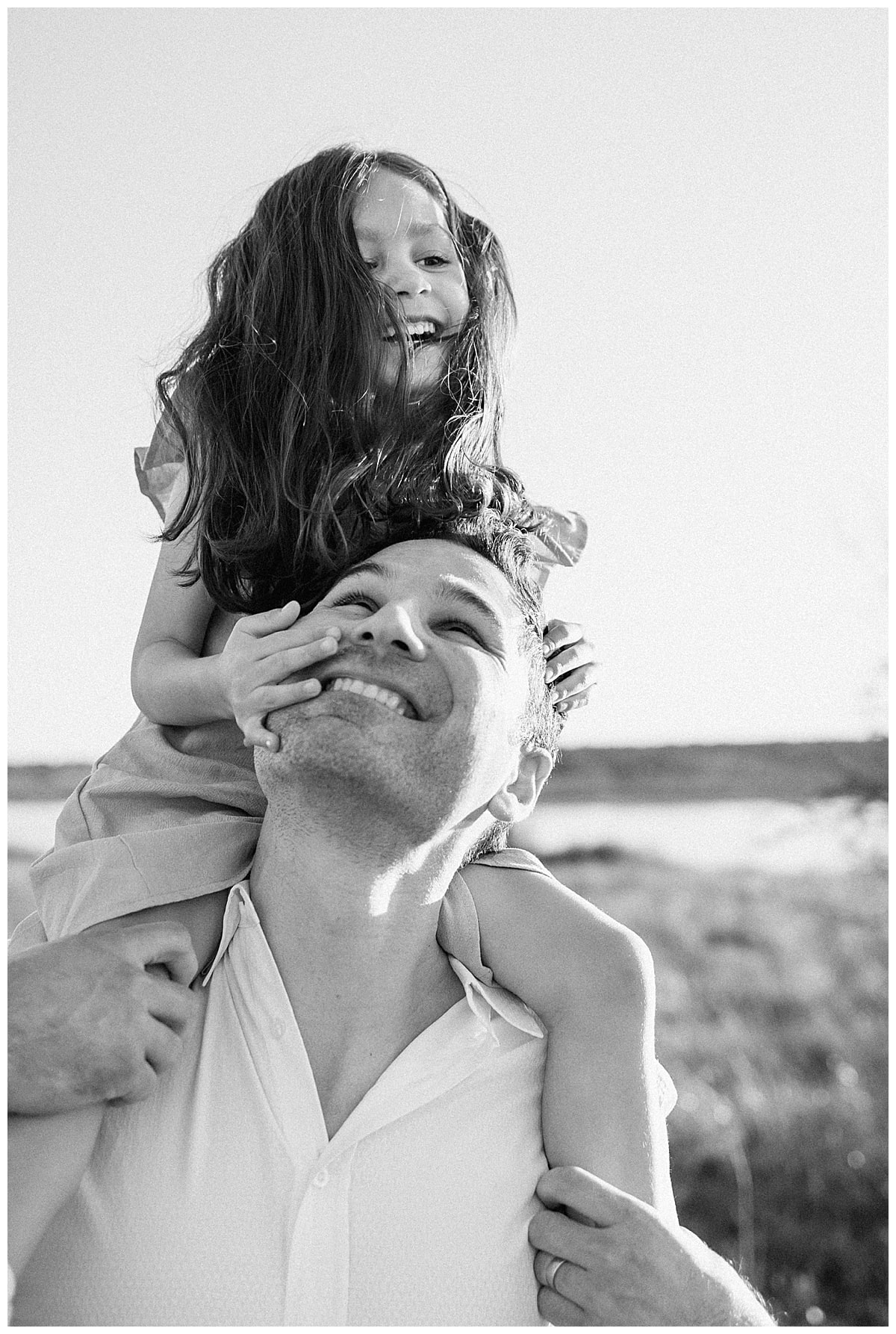 Daughter rides on dads shoulder for Austin Motherhood Photographer