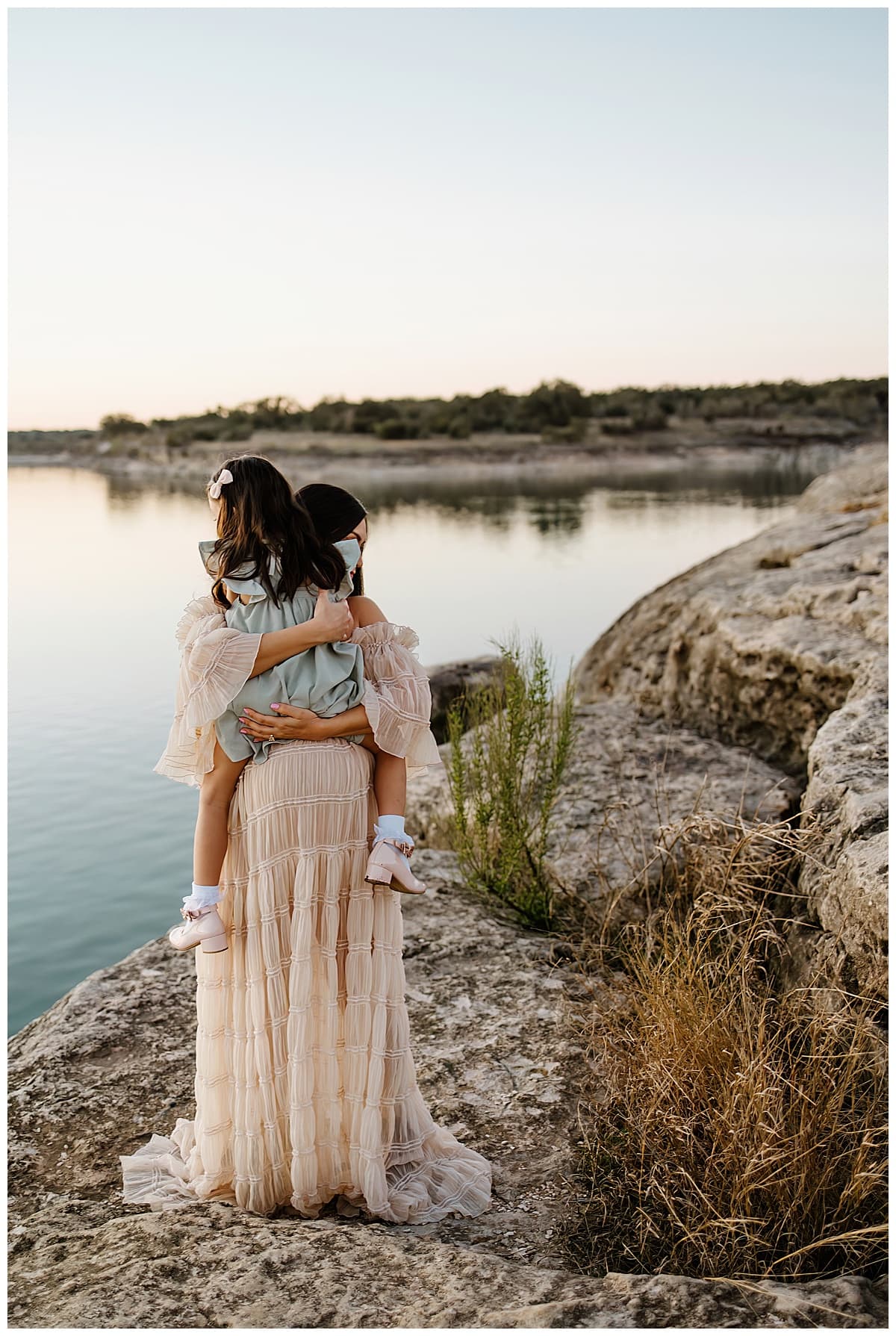 Mom and daughter share a hug for Austin Motherhood Photographer