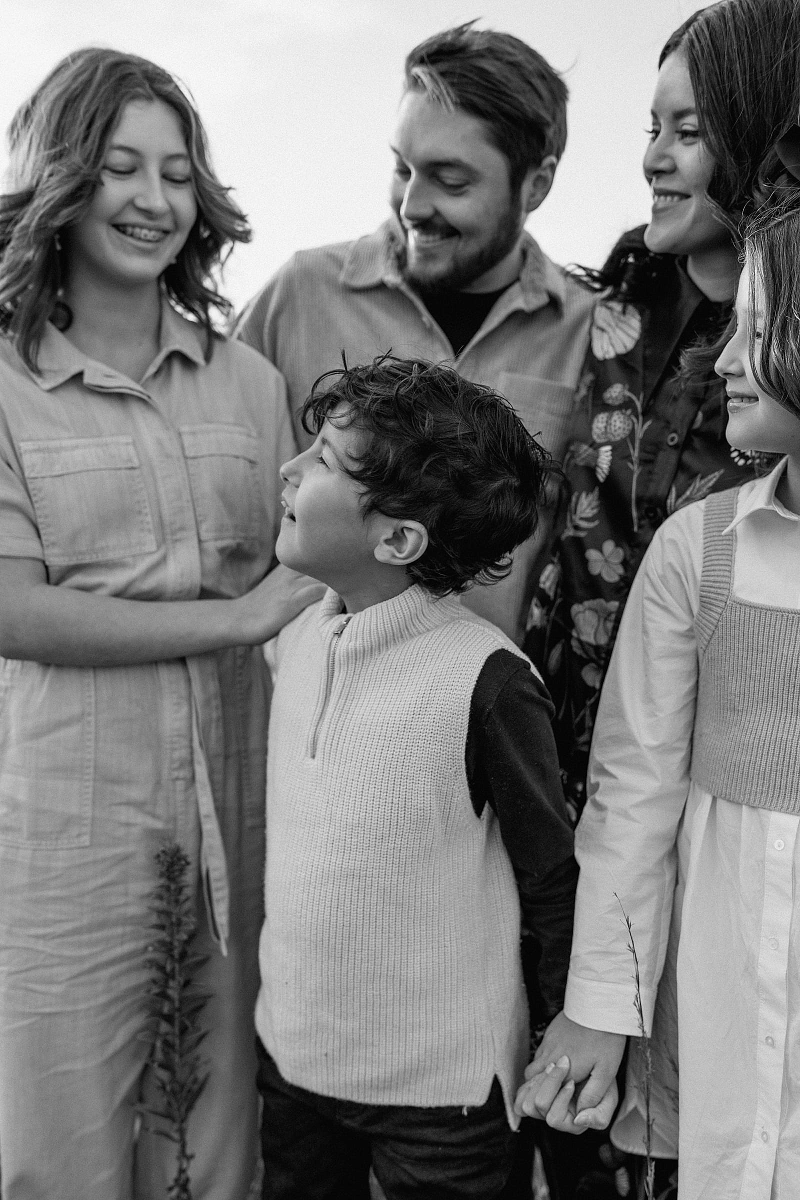 Family smile together for Austin Family Photographer