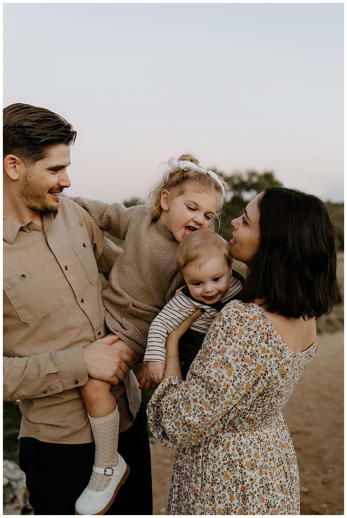Parents hold their children for Austin Lifestyle Photographer