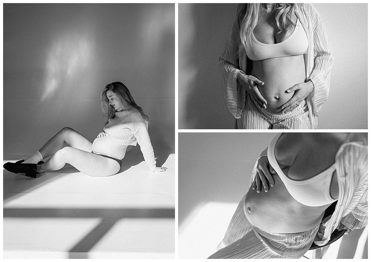 Woman embraces her pregnancy during her studio maternity session
